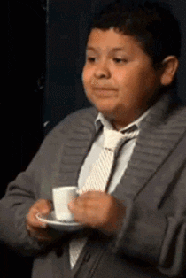 Manny from "Modern Family" sips a coffee like a gentleman