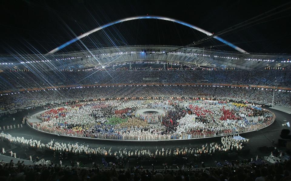 Teams enter the stadium for the parade of nations in the Athens 2004 Summer Olympic Games.