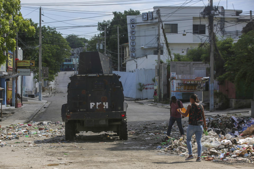 An armored police vehicle patrols in Port-au-Prince, Haiti, Monday, June 24, 2024. (AP Photo/Odelyn Joseph)