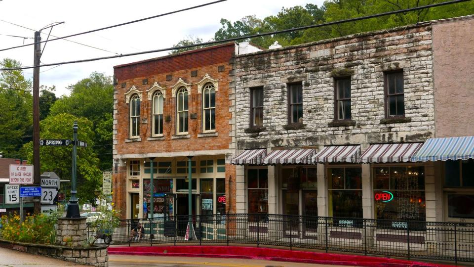 Streets and buildings of Spring Street in Eureka Springs Arkansas after a fall rain.