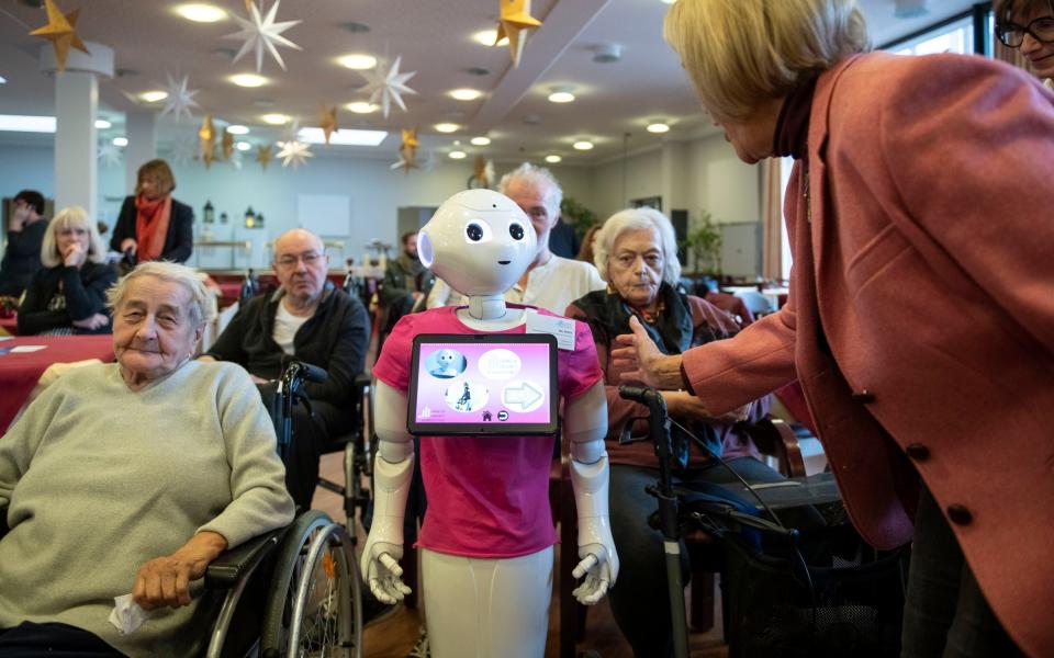 Robots Presentation At Senior Care Center  - Thomas Lohnes/Getty Images