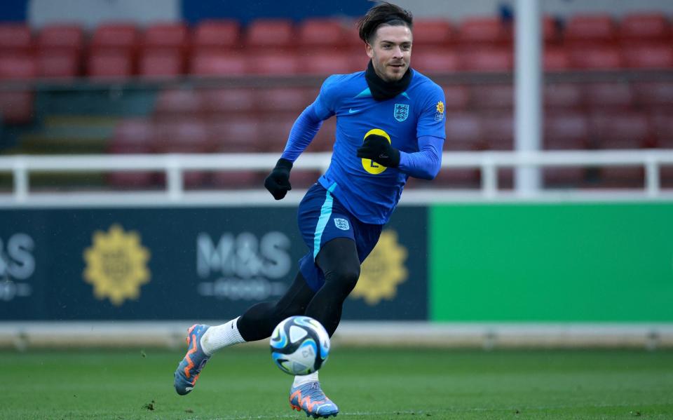 Jack Grealish of England runs during a training session at St George's Park on March 20, 2023 in Burton upon Trent, England - Getty Images/Eddie Keogh