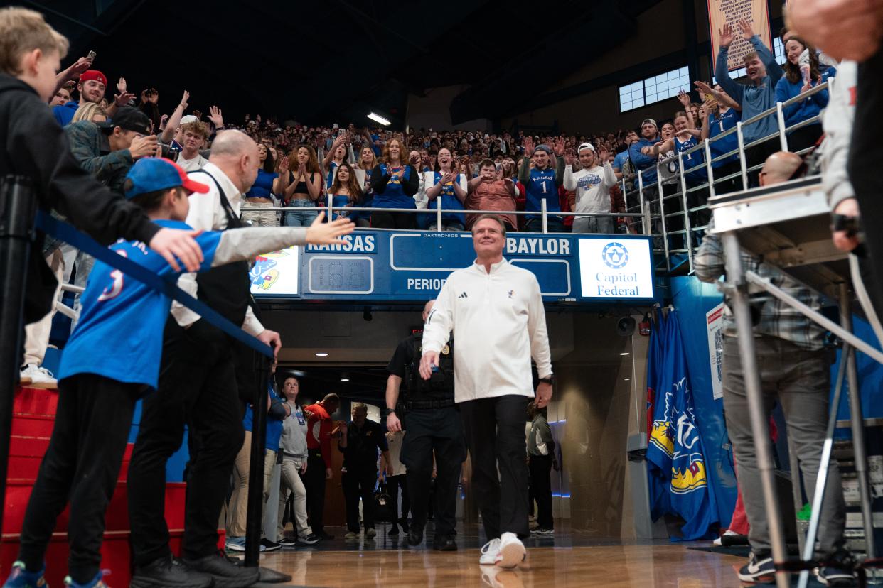 Kansas basketball coach Bill Self walks on to the court at Allen Fieldhouse before taking on Baylor for a game on Feb. 10, 2024.