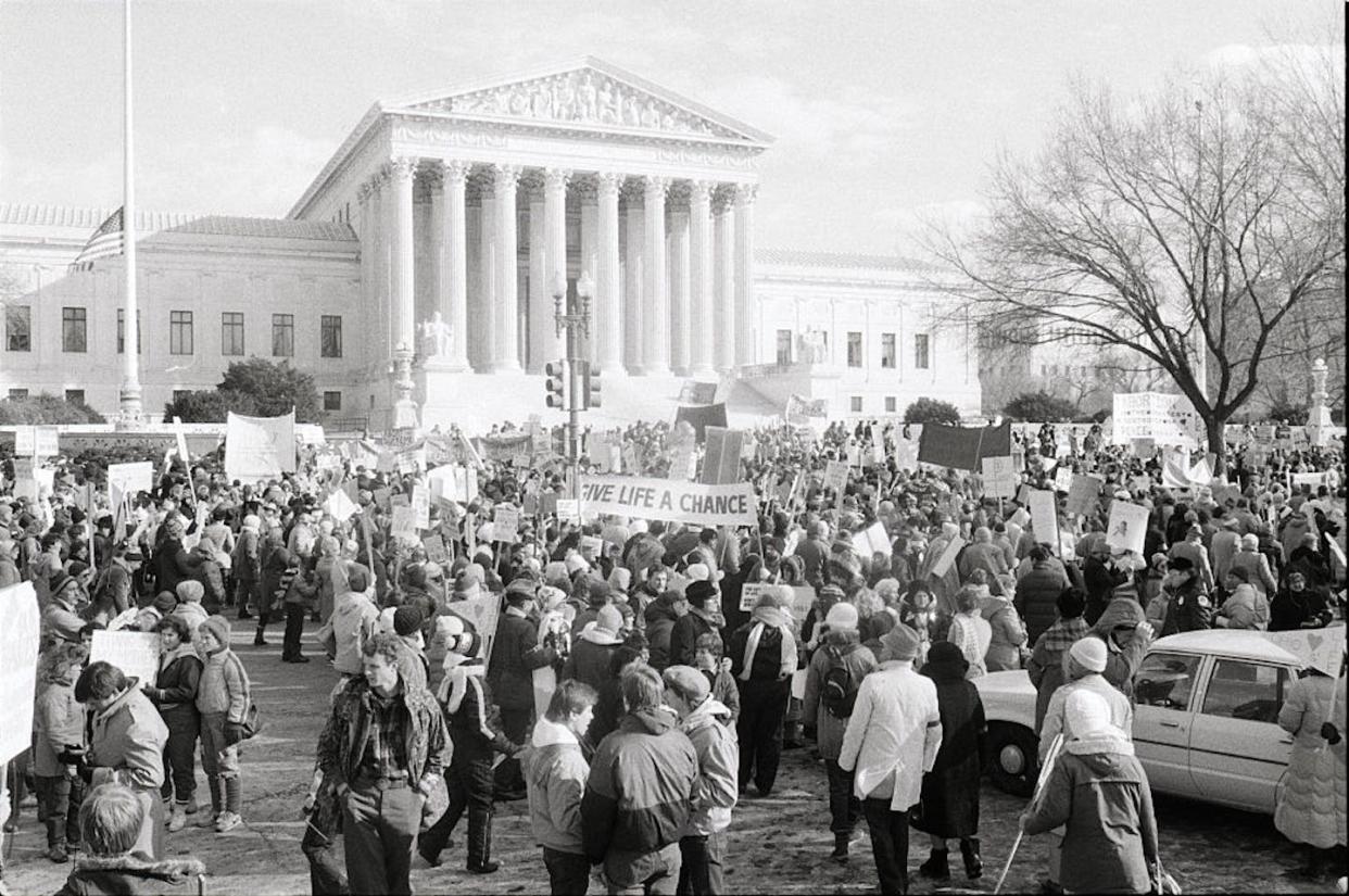 Anti-abortion protesters demonstrate in front of the Supreme Court in 1985, the 12th anniversary of the Roe v. Wade decision. <a href="https://www.gettyimages.com/detail/news-photo/washington-d-c-anti-abortionists-demonstrate-in-front-of-news-photo/515955026?phrase=1973%20abortion&adppopup=true" rel="nofollow noopener" target="_blank" data-ylk="slk:Bettmann/Bettmann via Getty Images;elm:context_link;itc:0;sec:content-canvas" class="link ">Bettmann/Bettmann via Getty Images</a>