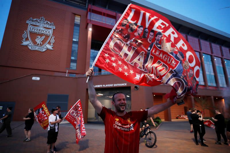 Premier League - Liverpool fans celebrate winning the Premier League