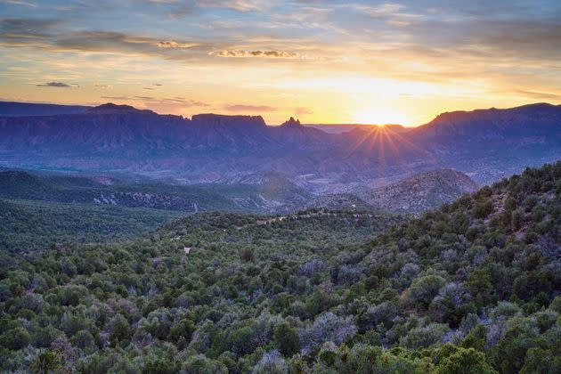 The sun sets behind the Palisade as seen from the northern slopes of Pine Mountain in southwest Colorado. Reformers view BLM lands like these as an under-appreciated conservation asset.