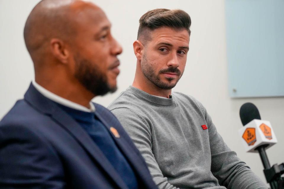 Rhode Island FC coach Khano Smith, left, says about the team's first player, Koke Vegas: "He represents the values and style that we want our club and team to have."