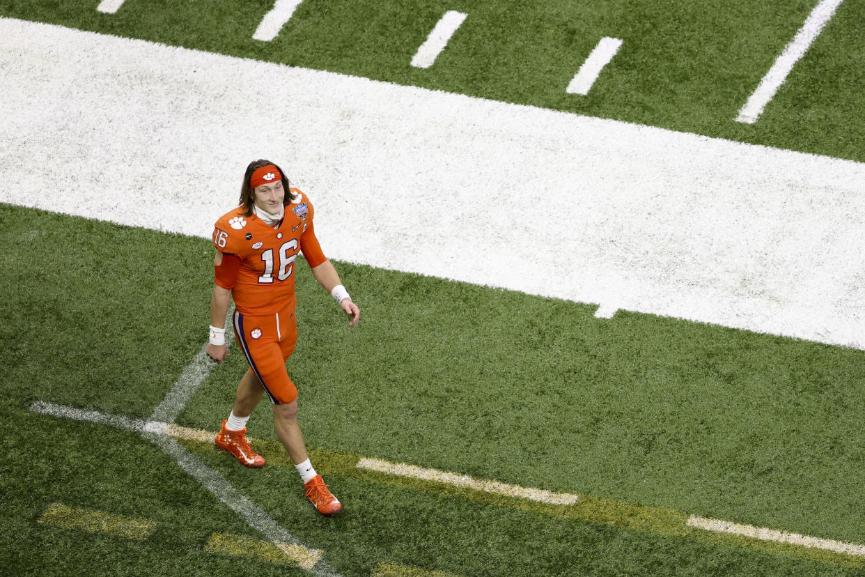 Clemson quarterback Trevor Lawrence had a tough night at the Sugar Bowl while his next potential coach in the NFL was looking on. (AP Photo/Butch Dill)