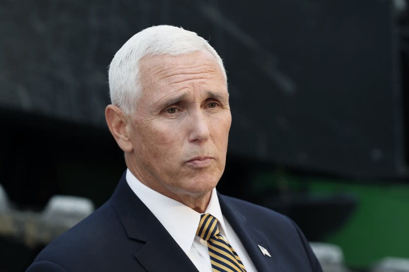 Vice President Mike Pence speaks to reporters during a visit to the Manning Farms, Wednesday, Oct. 9, 2019, in Waukee, Iowa. (AP Photo/Charlie Neibergall)