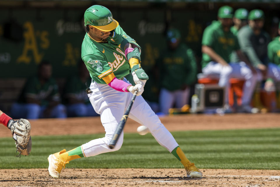 Oakland Athletics' Esteury Ruiz hits a single against the Cincinnati Reds during the fourth inning of a baseball game in Oakland, Calif., Saturday, April 29, 2023. (AP Photo/John Hefti) /// [EXTERNAL]