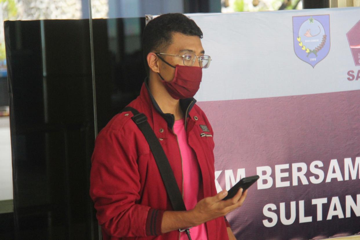 A man who used a fake identity arrives at the Sultan Babullah airport in Ternate, Indonesia. (Copyright 2021 The Associated Press. All rights reserved.)