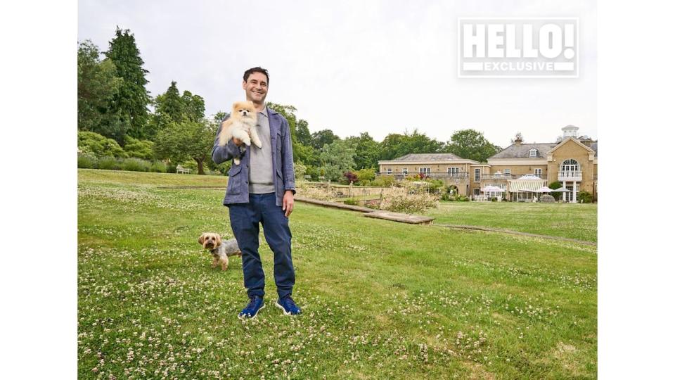 Pierre Mascolo posing with dogs outside Surrey home Summerdown Manor 