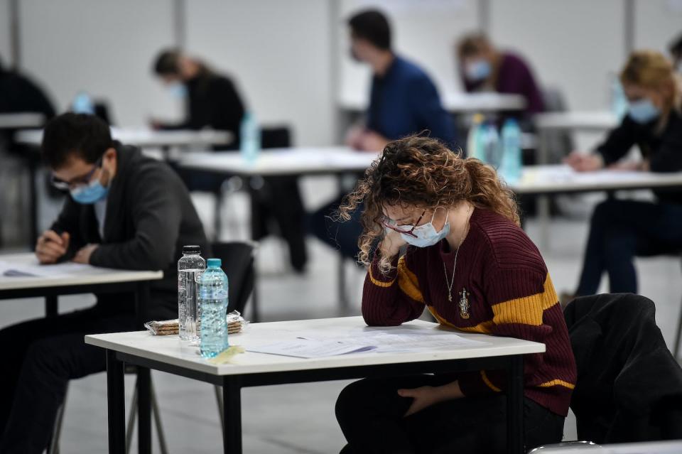 Exams have traditionally been taken in specially set-up halls, with staff to check no one cheats. <a href="https://www.shutterstock.com/image-photo/bucharest-romania-november-15-2020-large-1854615049" rel="nofollow noopener" target="_blank" data-ylk="slk:Shutterstock;elm:context_link;itc:0;sec:content-canvas" class="link ">Shutterstock</a>