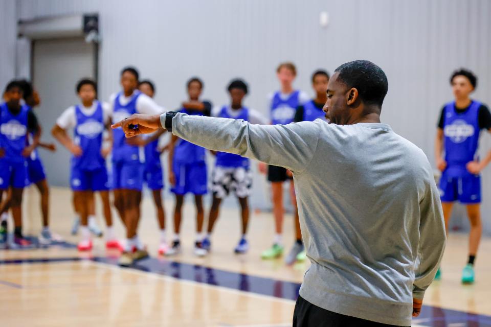Coach Carlos Adamson runs drills during a Grind Prep basketball practice at the Oklahoma Athletic Center in Oklahoma City, on Monday, April 1, 2024.