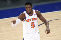 New York Knicks' RJ Barrett reacts after scoring during the second half against the Charlotte Hornets in an NBA basketball game Tuesday, April 20, 2021, in New York. (Sarah Stier/Pool Photo via AP)