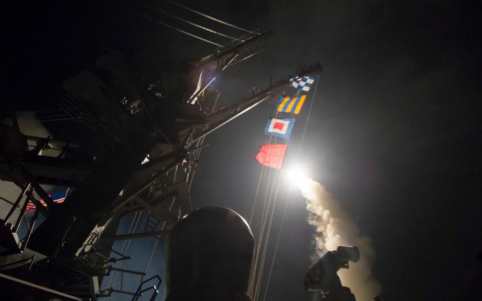 USS Ross fires a tomahawk land attack missile  - Credit: ROBERT S. PRICE/AFP/Getty