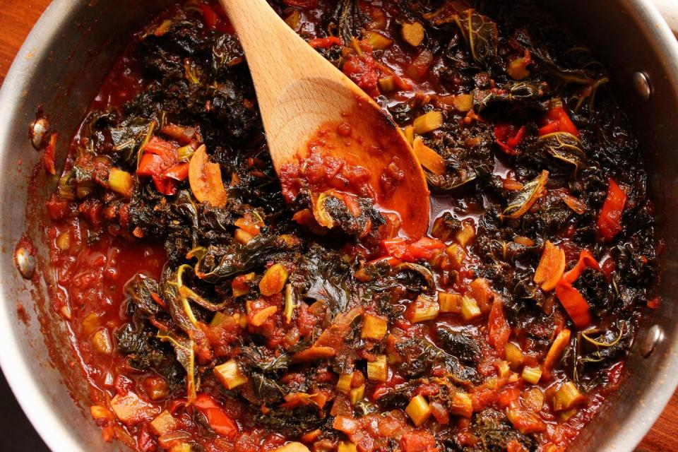 <p>Inspired by the delicious smoky greens that often come with a good <a href="https://www.delish.com/cooking/recipe-ideas/a39509942/bbq-brisket-recipe/" rel="nofollow noopener" target="_blank" data-ylk="slk:barbecue brisket;elm:context_link;itc:0;sec:content-canvas" class="link ">barbecue brisket</a> platter, this <a href="https://www.delish.com/cooking/g39461965/kale-recipes-and-ideas/" rel="nofollow noopener" target="_blank" data-ylk="slk:kale;elm:context_link;itc:0;sec:content-canvas" class="link ">kale</a> is a little spicy, a little tangy, equal parts sweet and salty. It's a flavorful side dish you can whip up any time, for vegans and meat lovers alike!</p><p>Get the <strong><a href="https://www.delish.com/cooking/recipe-ideas/a35338863/braised-kale-recipe/" rel="nofollow noopener" target="_blank" data-ylk="slk:BBQ Braised Kale recipe;elm:context_link;itc:0;sec:content-canvas" class="link ">BBQ Braised Kale recipe</a></strong>.</p>