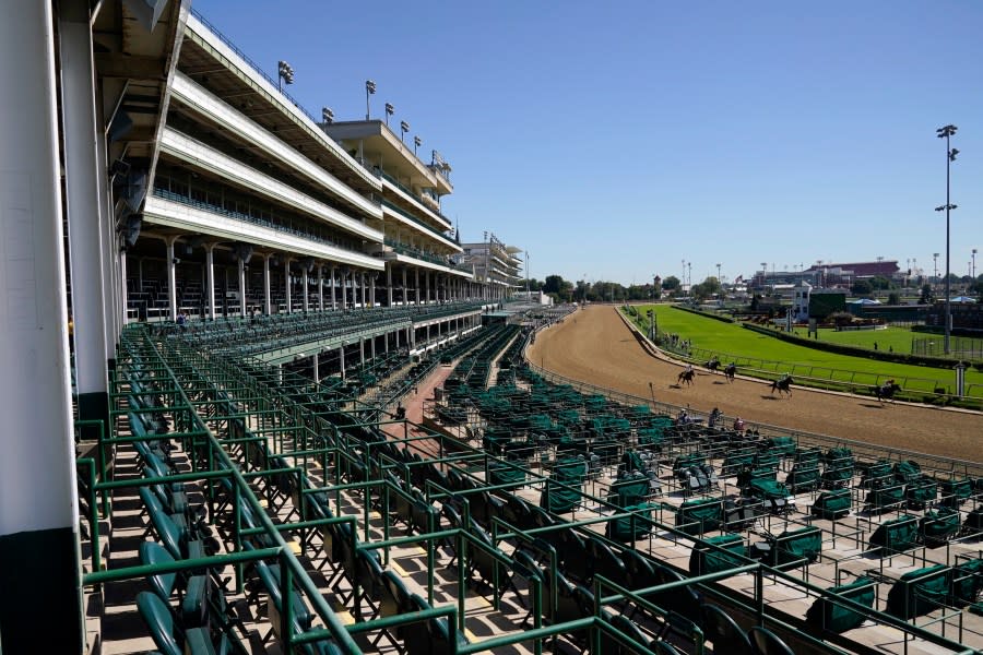 FILE – Horses run during a race before the 146th running of the Kentucky Derby at Churchill Downs, Saturday, Sept. 5, 2020, in Louisville, Ky. The Derby has survived two world wars, the Great Depression, and pandemics, including COVID-19 in 2020, when it ran in virtual silence without the usual crowd of 150,000. (AP Photo/Charlie Riedel)