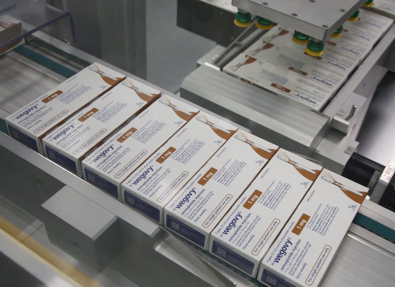 FILE PHOTO: Boxes of Wegovy move along a packaging line at Novo Nordisk's facility in Hillerod
