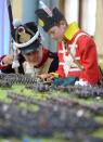 Re-enactor Phil Timms, in his French 45e uniform with Fraser Bennet, 9, from Kingross, at the world's biggest historical table top war game.