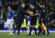 Britain Football Soccer - Everton v Sunderland - Premier League - Goodison Park - 25/2/17 Everton manager Ronald Koeman shakes hands with referee Stuart Attwell after the game Action Images via Reuters / Carl Recine Livepic