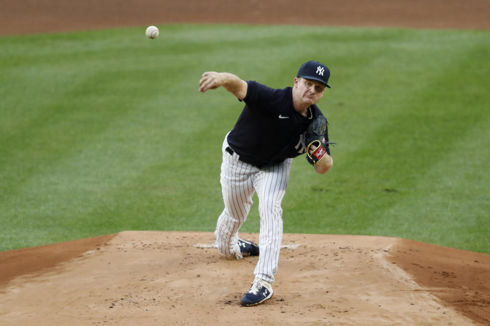 New York Yankees non-roster invitee Clarke Schmidt delivers during the first inning of an intrasquad baseball game Monday, July 6, 2020, at Yankee Stadium in New York. (AP Photo/Kathy Willens)