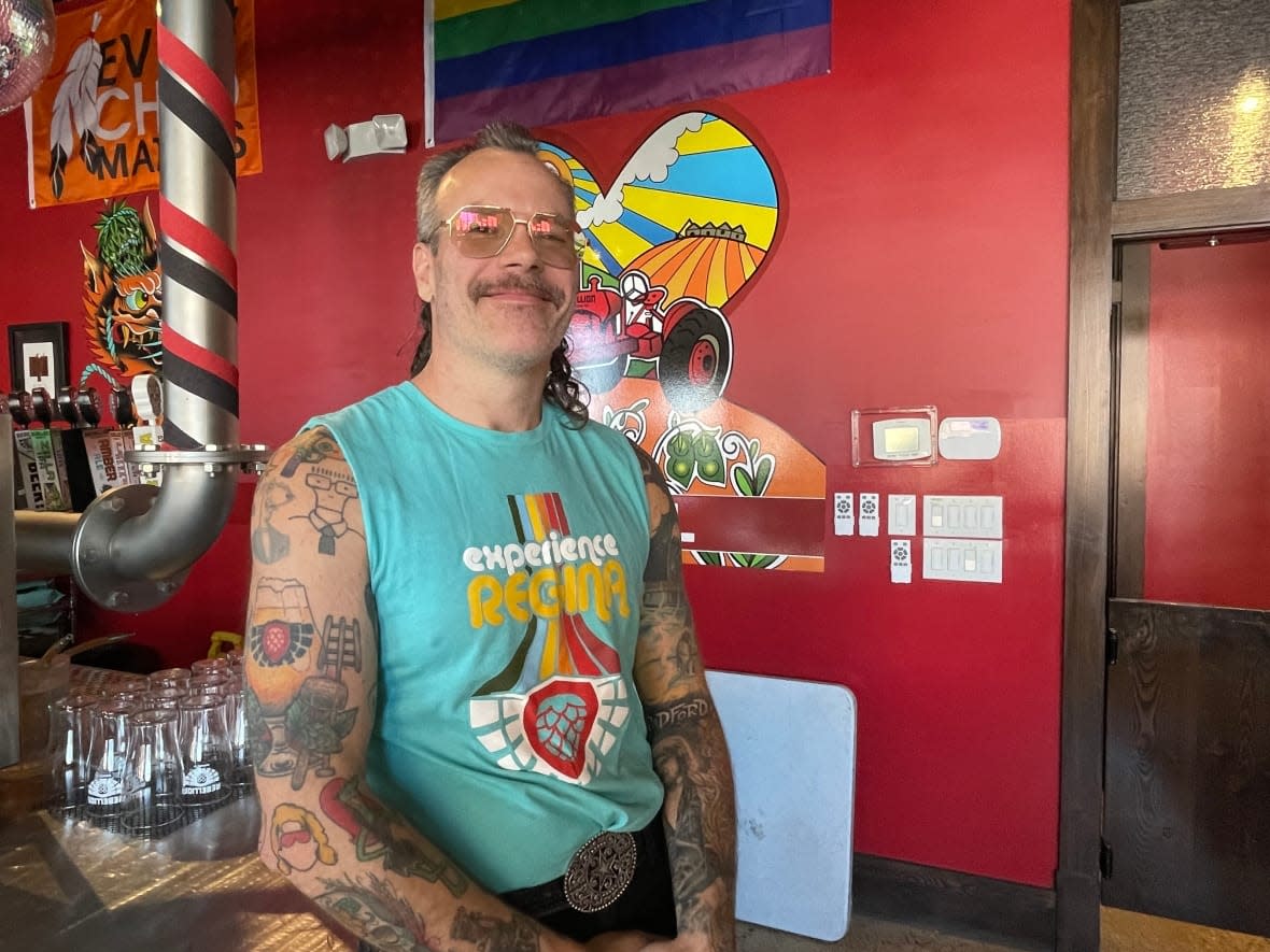 Experience Regina is a slogan that Rebellion Brewing has been using for years. Owner Mark Heise says he's happy to see the city leaning into the phrase's popularity.  (Alexander Quon/CBC - image credit)