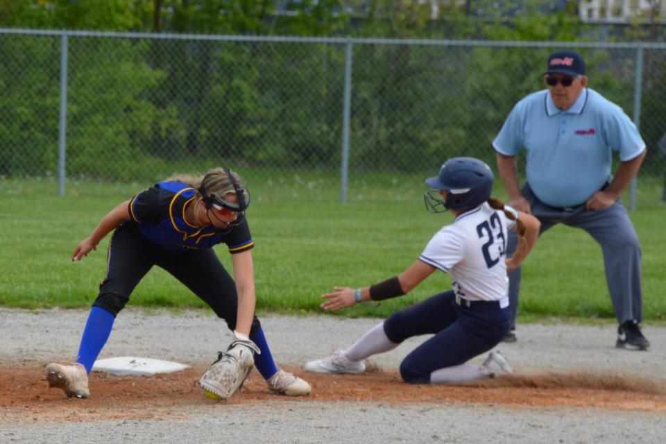 Olivia TIlley of Airport steals second base as Jessica Schrader takes the throw for Ida during Airport's 7-0 and 5-3 softball sweep of Ida on Friday, May 3, 2024.