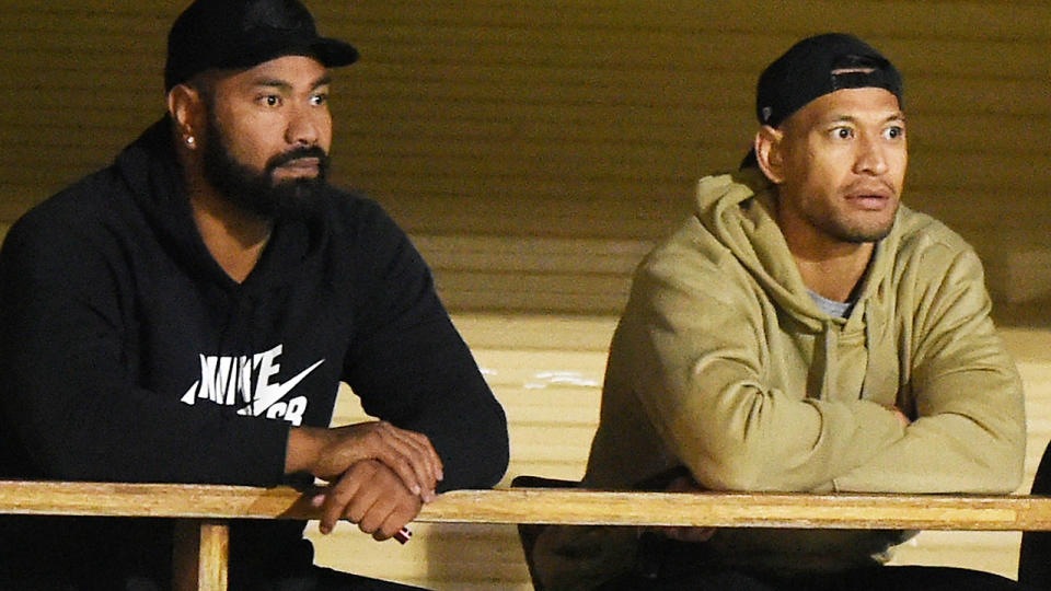 Tony Williams and Israel Folau, pictured here watching the Southport Tigers' loss to Burleigh Bears.