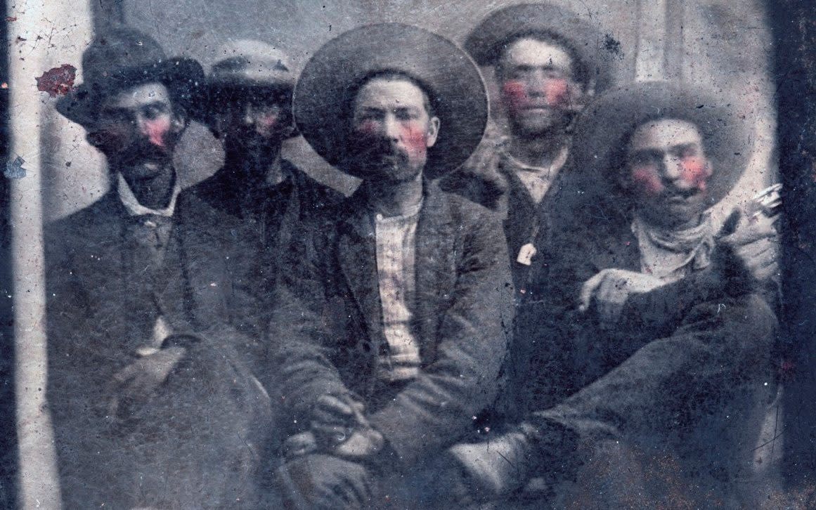 Billy the Kid (second from left) and Pat Garrett and his killer Pat Garrett (far right) together