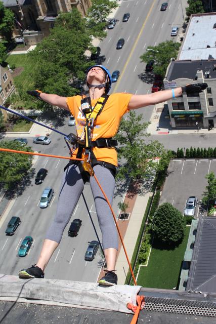 Molly Schneider rappels down a building in Columbus, Ohio to raise money for a human-trafficking organization in 2016.