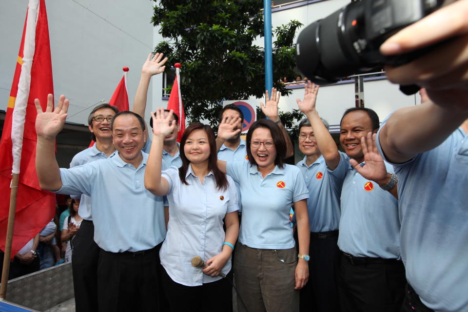 Workers Party's Lee Li Lian flanked by chief Low Thia Khiang and Sylvia Lim.