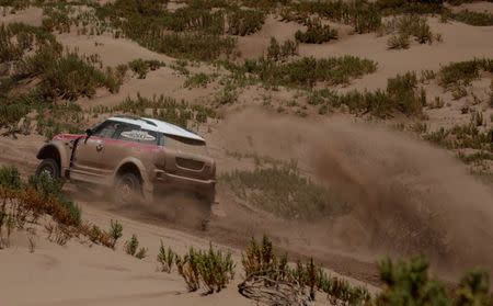 Dakar Rally - 2017 Paraguay-Bolivia-Argentina Dakar rally - 39th Dakar Edition - Fifth stage from Tupiza to Oruro, Bolivia 06/01/17. Mikko Hirvonen of Finland drives his Mini with his copilot Michel Perin. REUTERS/Ricardo Moraes