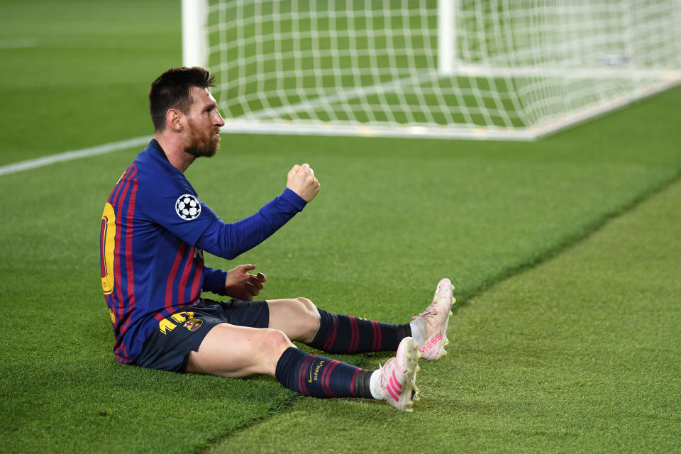 Lionel Messi of Barcelona celebrates after he scores his sides third goal during the UEFA Champions League Semi Final first leg match between Barcelona and Liverpool.