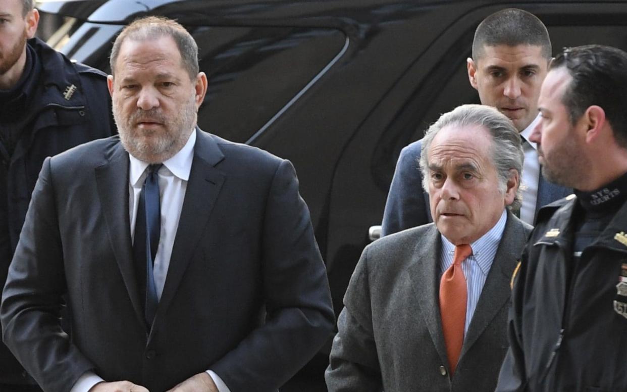 Harvey Weinstein with his previous lawyer Ben Brafman, who will step aside officially on Friday - AFP