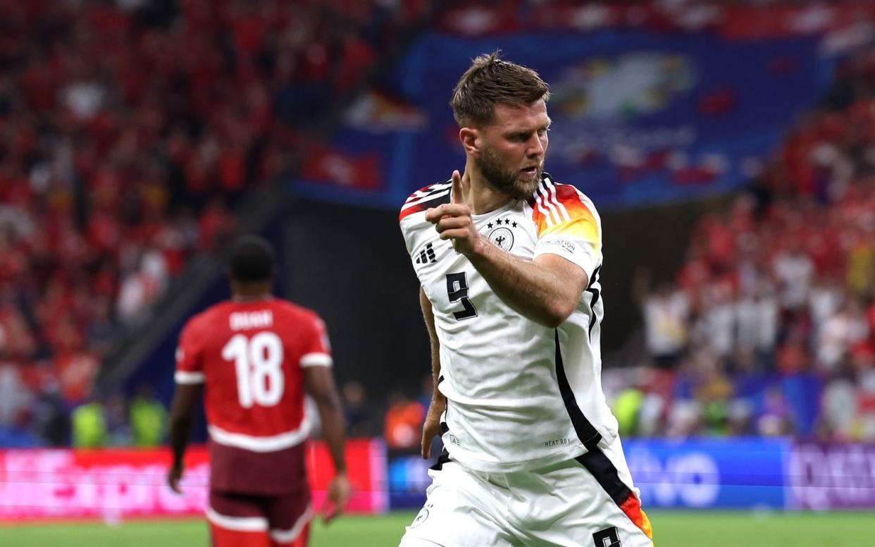 Last-Minute-Jubel: Mit seinem Kopfball zum 1:1-Ausgleich gegen die Schweiz sicherte Niclas Füllkrug Deutschland spät den Gruppensieg. (Bild: 2024 Getty Images / Alexander Hassenstein)