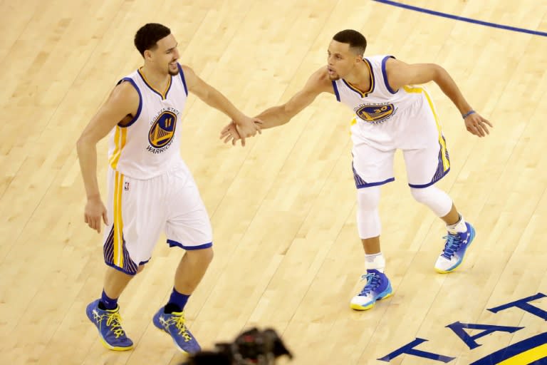 Klay Thompson (L) and Stephen Curry (R) outshined Russell Westbrook as the Golden State Warriors romped to a 111-95 victory against the Oklahoma City Thunder, at Chesapeake Energy Arena in Oklahoma City, on March 20, 2017