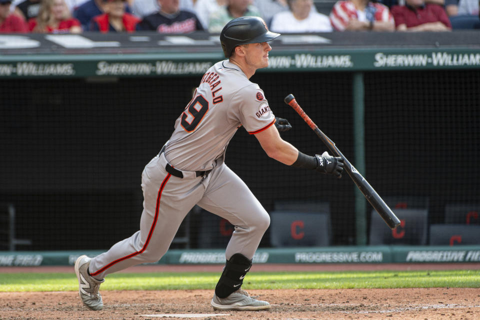 San Francisco Giants' Tyler Fitzgerald heads to first base with an RBI single off Cleveland Guardians relief pitcher Scott Barlow during the fifth inning of a baseball game in Cleveland, Saturday, July 6, 2024. (AP Photo/Phil Long)