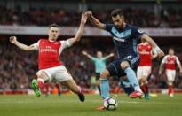 Britain Soccer Football - Arsenal v Middlesbrough - Premier League - Emirates Stadium - 22/10/16 Middlesbrough's Alvaro Negredo in action with Arsenal's Laurent Koscielny Action Images via Reuters / John Sibley Livepic