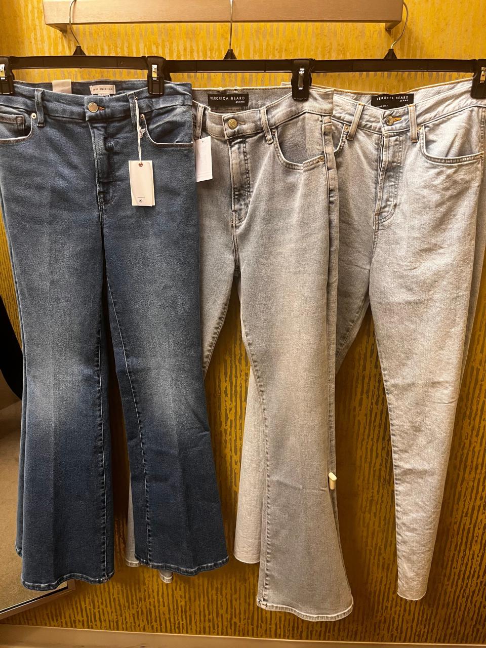 A rack of jeans in a Nordstrom dressing room.
