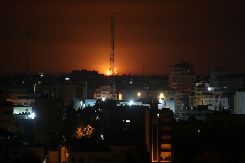 Flame and smoke are seen during an Israeli air strike in Gaza