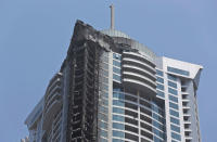 <p>Fire damage is shown on the Torch Tower at Marina district in Dubai, U.A.E., Friday, Aug. 4, 2017. (Photo: Kamran Jebreili/AP) </p>