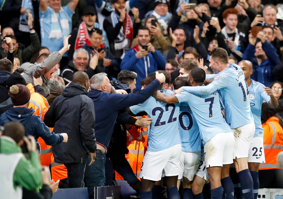 David Silva (obscured) celebrates the City opener after 12 minutes