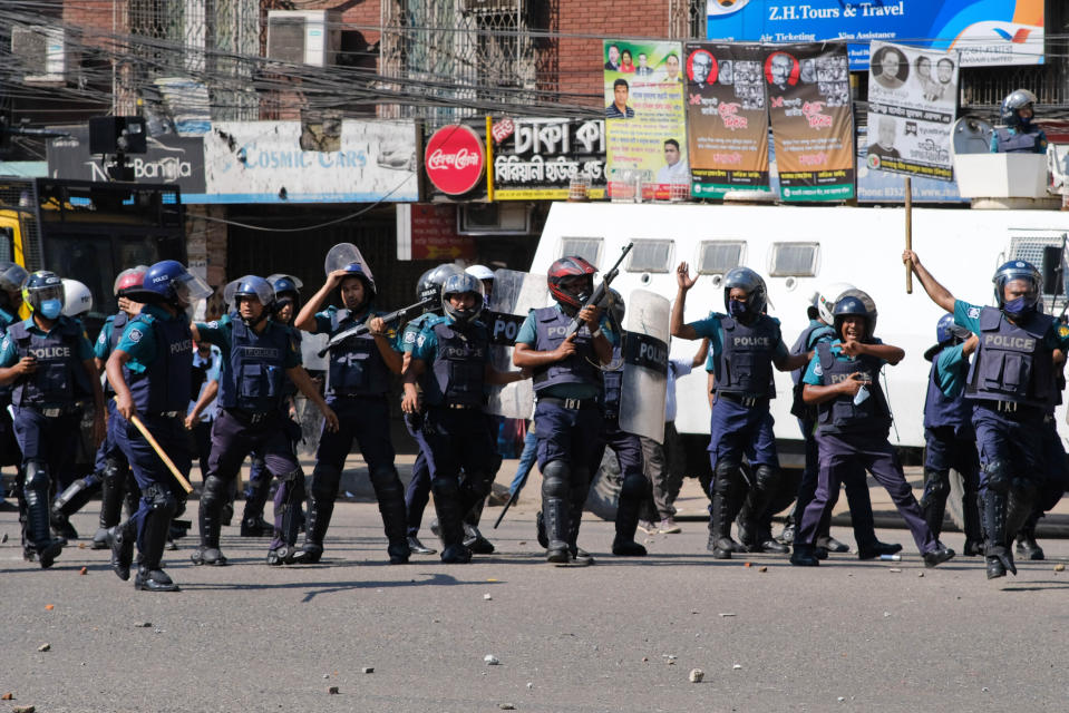 Police clash with Muslim devotees during a protest over an alleged insult to Islam, outside the country’ main Baitul Mukarram Mosque in Dhaka, Bangladesh, Friday, Oct. 15, 2021. Friday’s chaos in Dhaka followed reported incidents of vandalism of Hindu temples in parts of the Muslim-majority Bangladesh after photographs of a copy of the Holy book Quran at the feet of of a Hindu Goddess went viral on social media in a temple at Cumilla district in eastern Bangladesh. (AP Photo/Mahmud Hossain Opu, File)