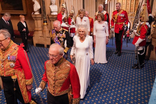 The King and Queen walking side by side as the arrive at the State Opening