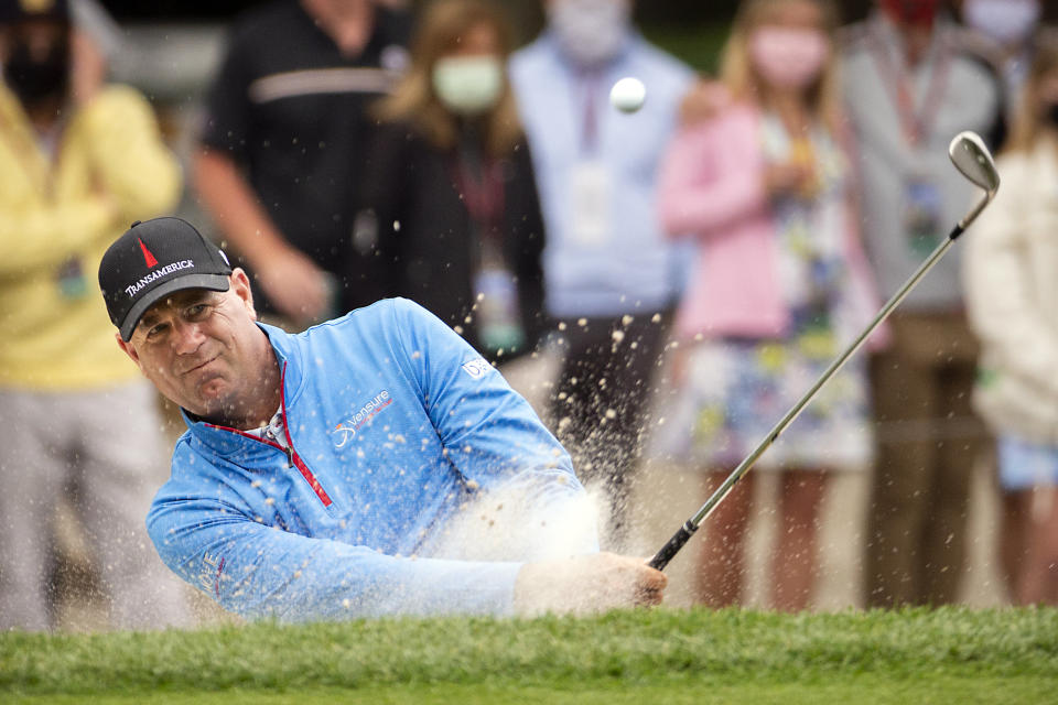 Stewart Cink hits out of the bunker on the 15th hole during the second round of the RBC Heritage golf tournament in Hilton Head Island, S.C., Friday, April 16, 2021. (AP Photo/Stephen B. Morton)