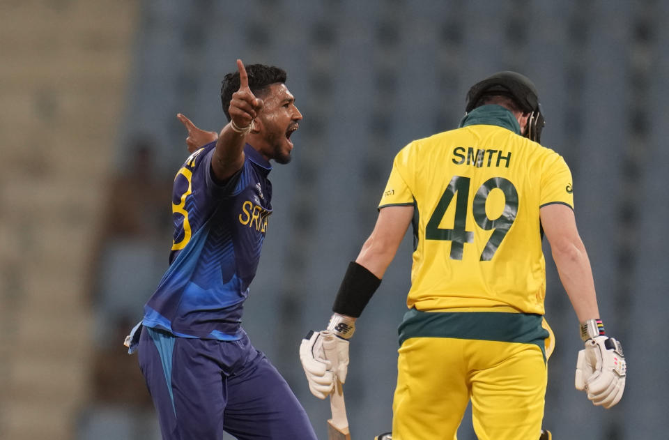 Sri Lanka's Dilshan Madushanka celebrates the wicket of Australia's Steve Smith during the ICC Men's Cricket World Cup match between Australia and Sri Lanka in Lucknow, India, Monday, Oct. 16, 2023. (AP Photo/Aijaz Rahi)
