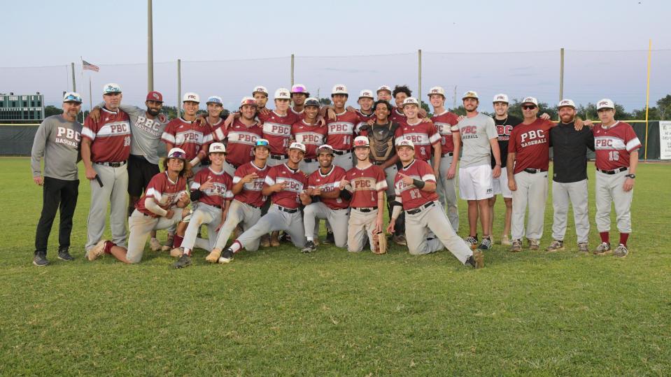 The Palm Beach Central baseball team poses for a celebratory photo following the Broncos' regional quarterfinals victory over No. 1 seed Jupiter on Tuesday, May 10, 2022.