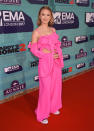 <p>Zara Larsson wore a pink two-piece ensemble on the red carpet. The coolest part of the look though? The fact that she wore Converse sneakers instead of high heels. (Photo: Getty Images) </p>