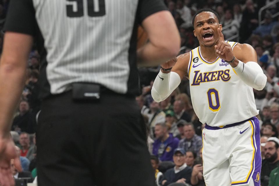Lakers guard Russell Westbrook complains, “come on that was 12 seconds,” to referee Gediminas Petraitis after being called for lane violation while Bucks forward Giannis Antetokounmpo was at the free throw line Friday night.